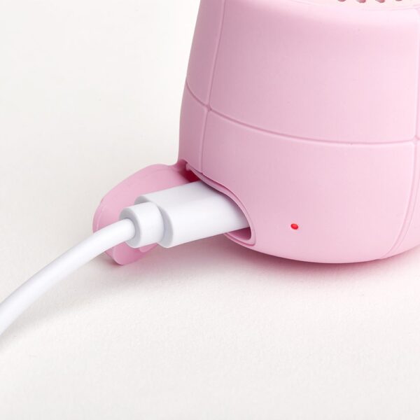 mino-x-water-resistant-bluetooth-speaker-soft-pink-02-amara